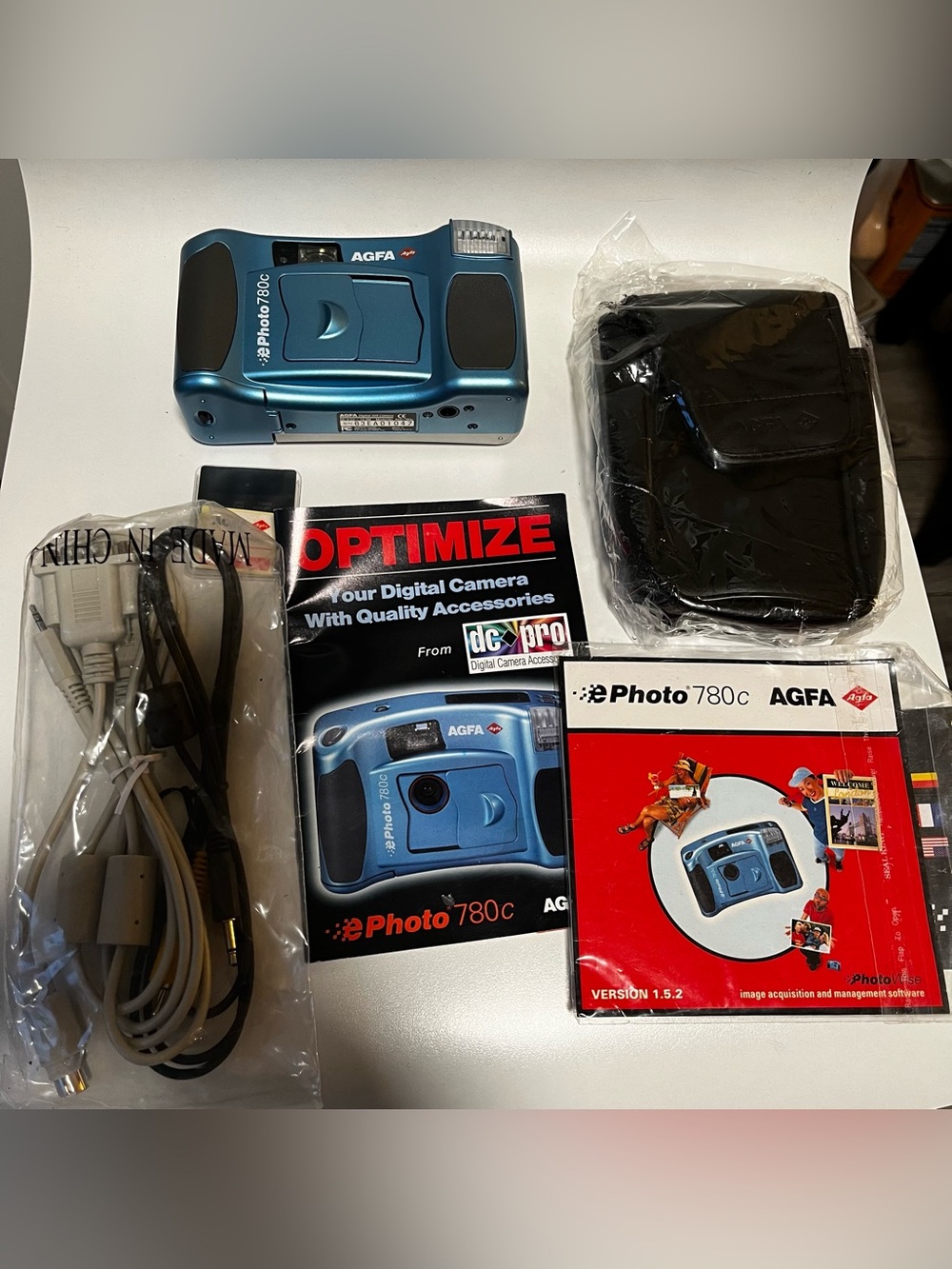 ePhoto 780c Digital Camera in Blue with Accessories
